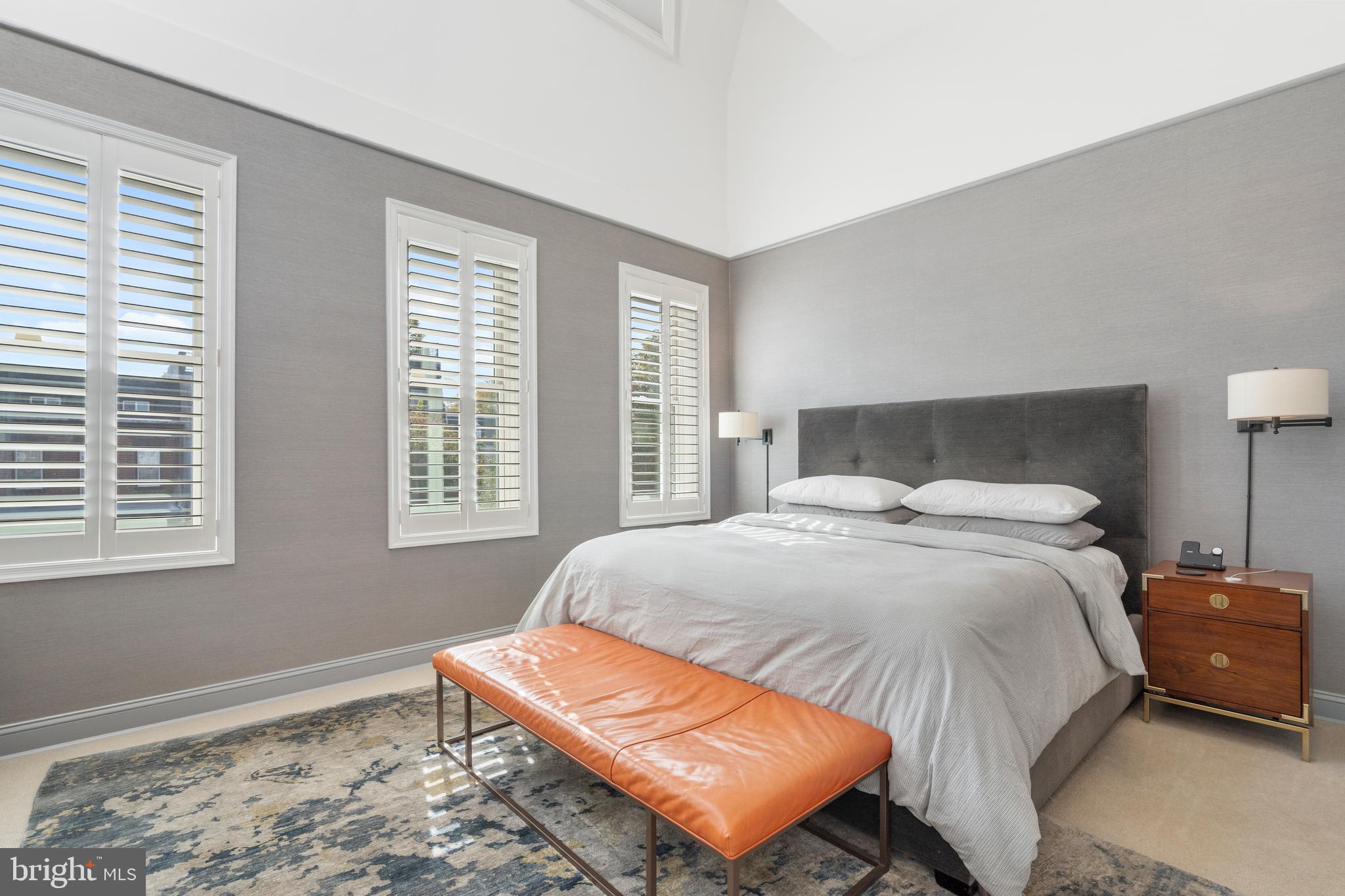 33 W Street Northwest, Unit 1 Washington, DC 20001 - Photo 28 of 36 a bedroom with a bed and wooden floor