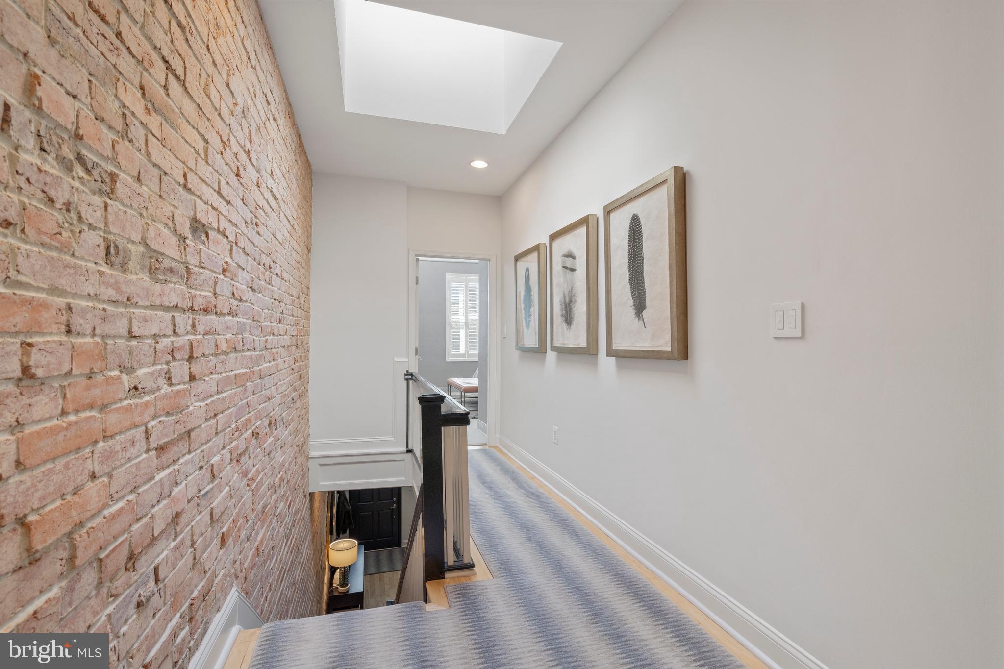 33 W Street Northwest, Unit 1 Washington, DC 20001 - Photo 36 of 36 a hallway with front door and stairs