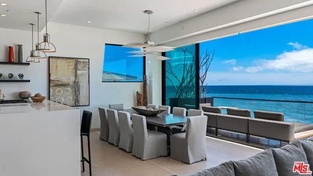 a kitchen with sink cabinets and appliances