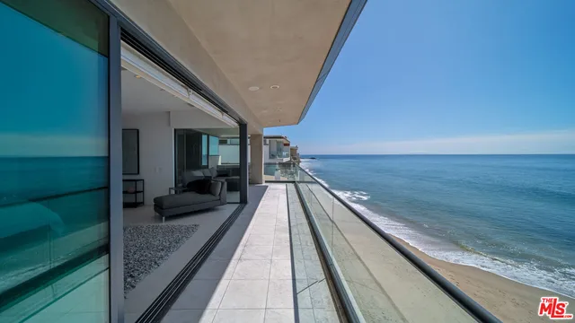 a bathroom with a sink a mirror and a shower