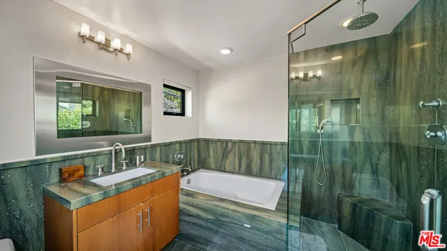 a lobby with furniture and floor to ceiling window