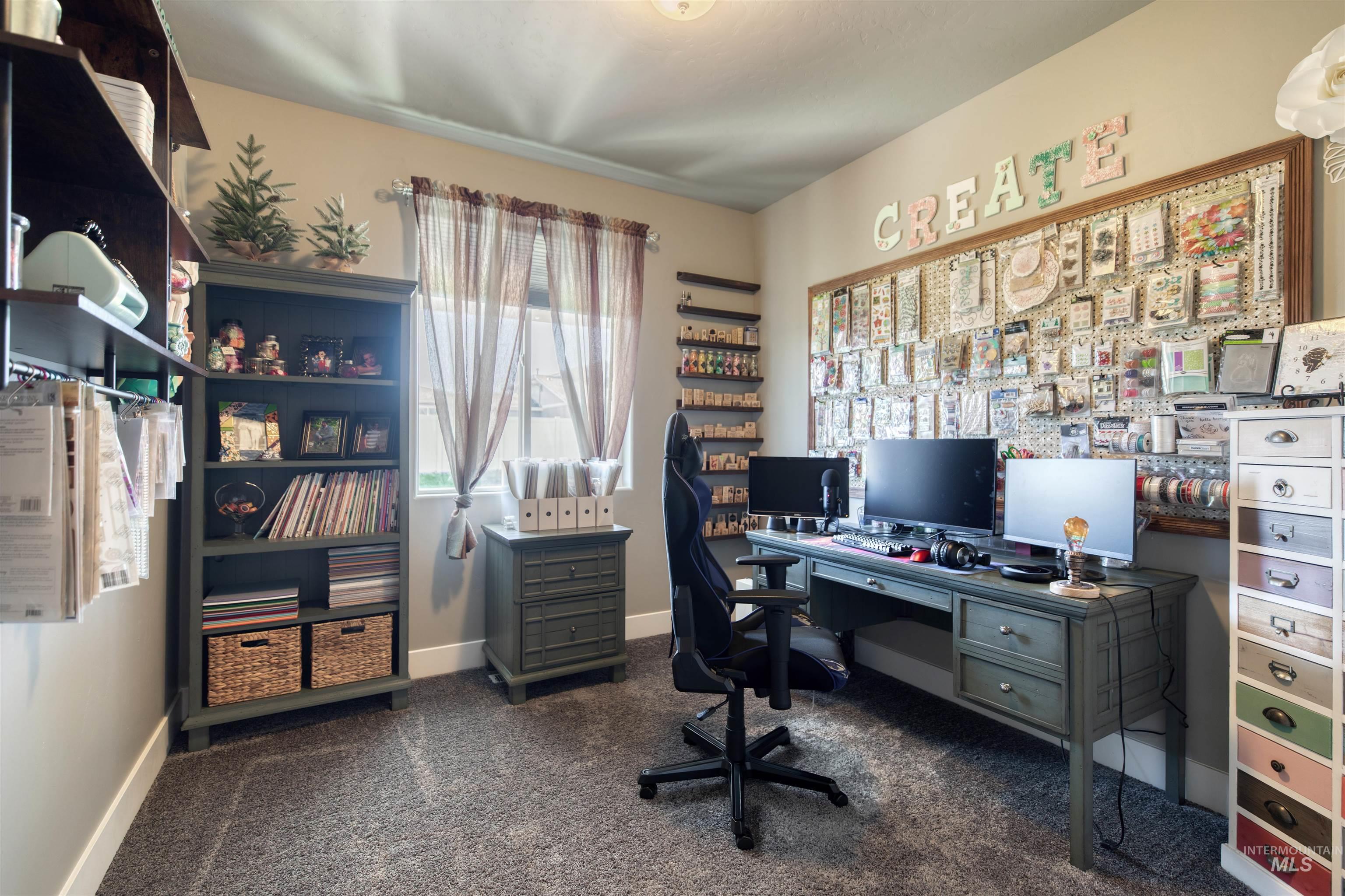 11913 West Piazza Street Nampa, ID 83686 - Photo 18 of 50 Office area with dark colored carpet and baseboards