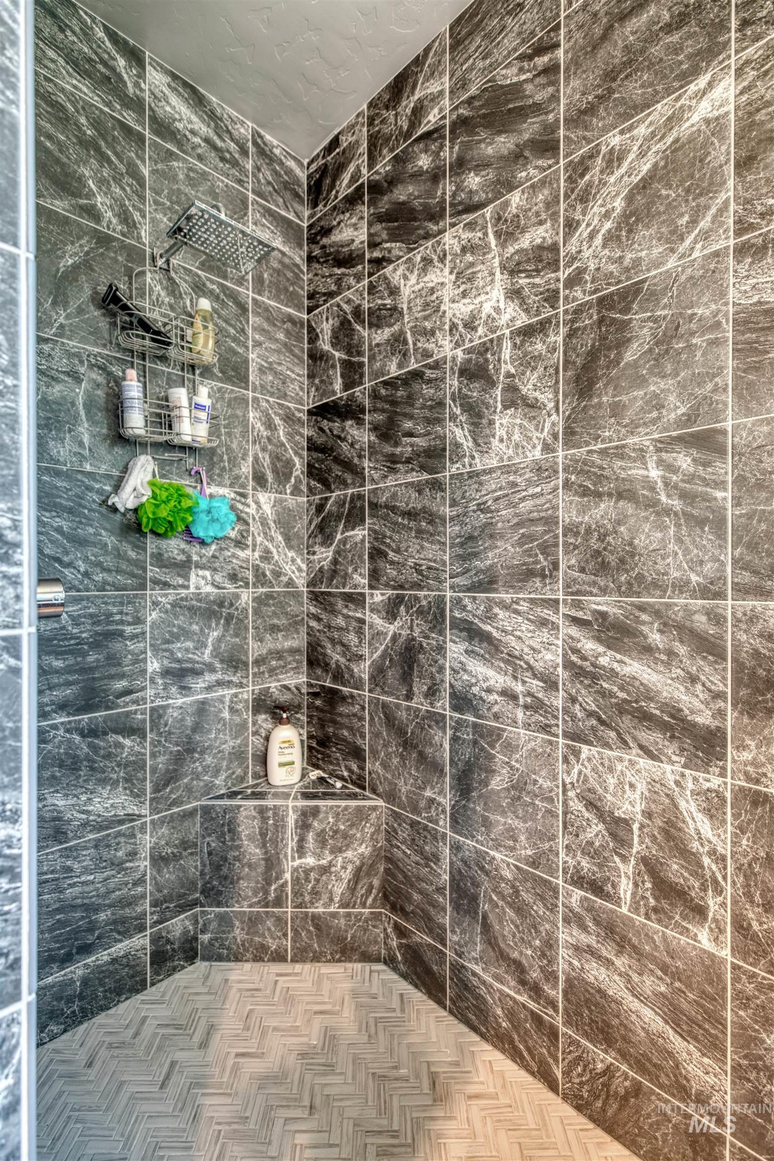 11913 West Piazza Street Nampa, ID 83686 - Photo 24 of 50 Full bathroom featuring a stall shower