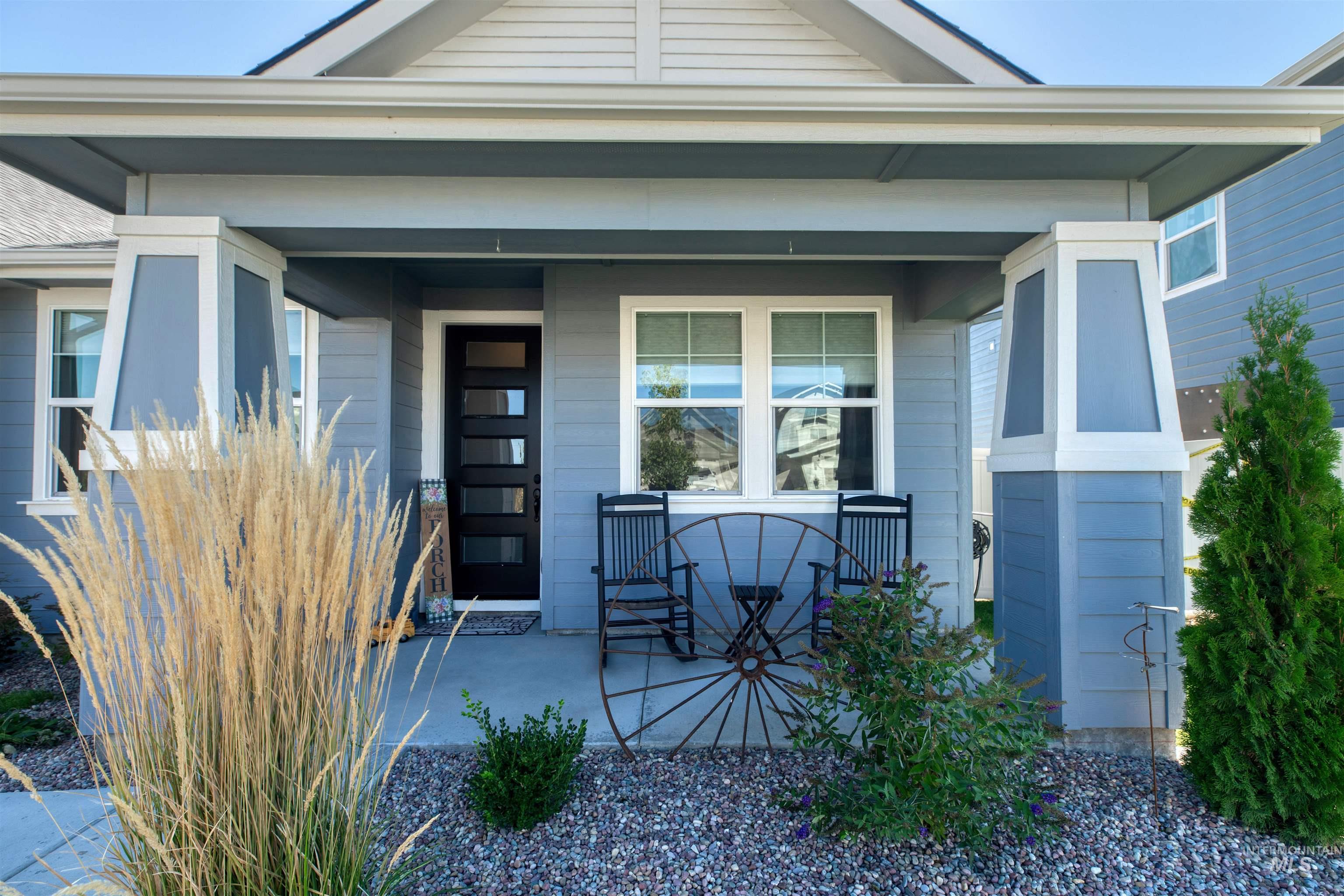 11913 West Piazza Street Nampa, ID 83686 - Photo 3 of 50 Property entrance with a porch