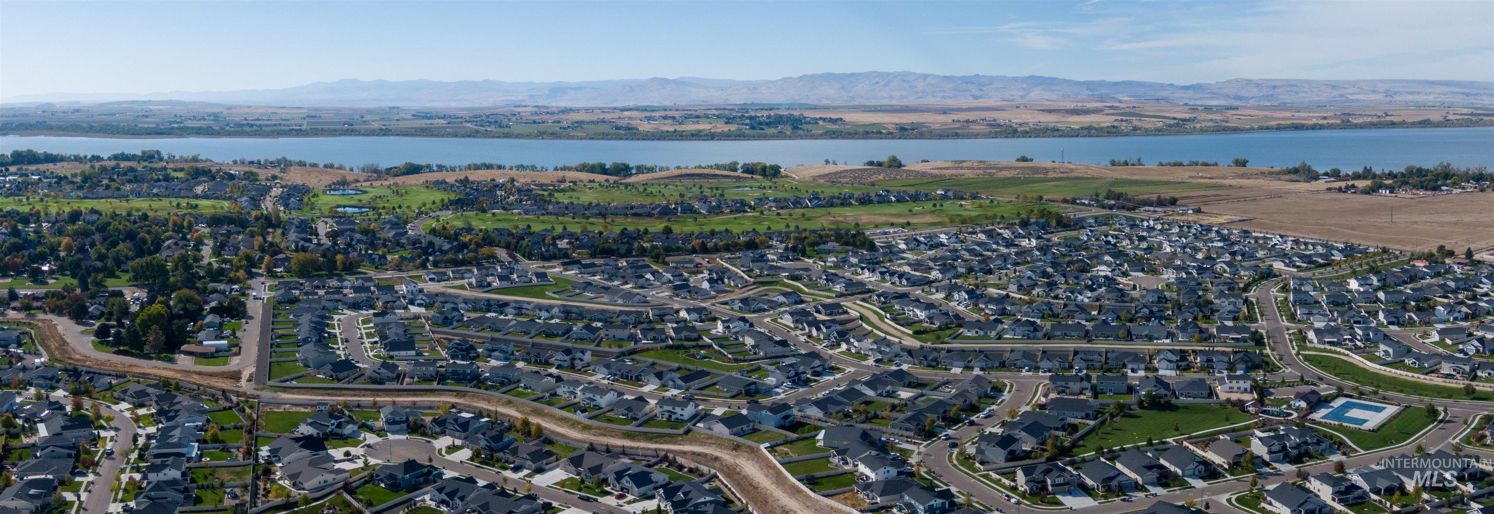11913 West Piazza Street Nampa, ID 83686 - Photo 48 of 50 Aerial overview of property's location featuring nearby suburban area and a water and mountain view