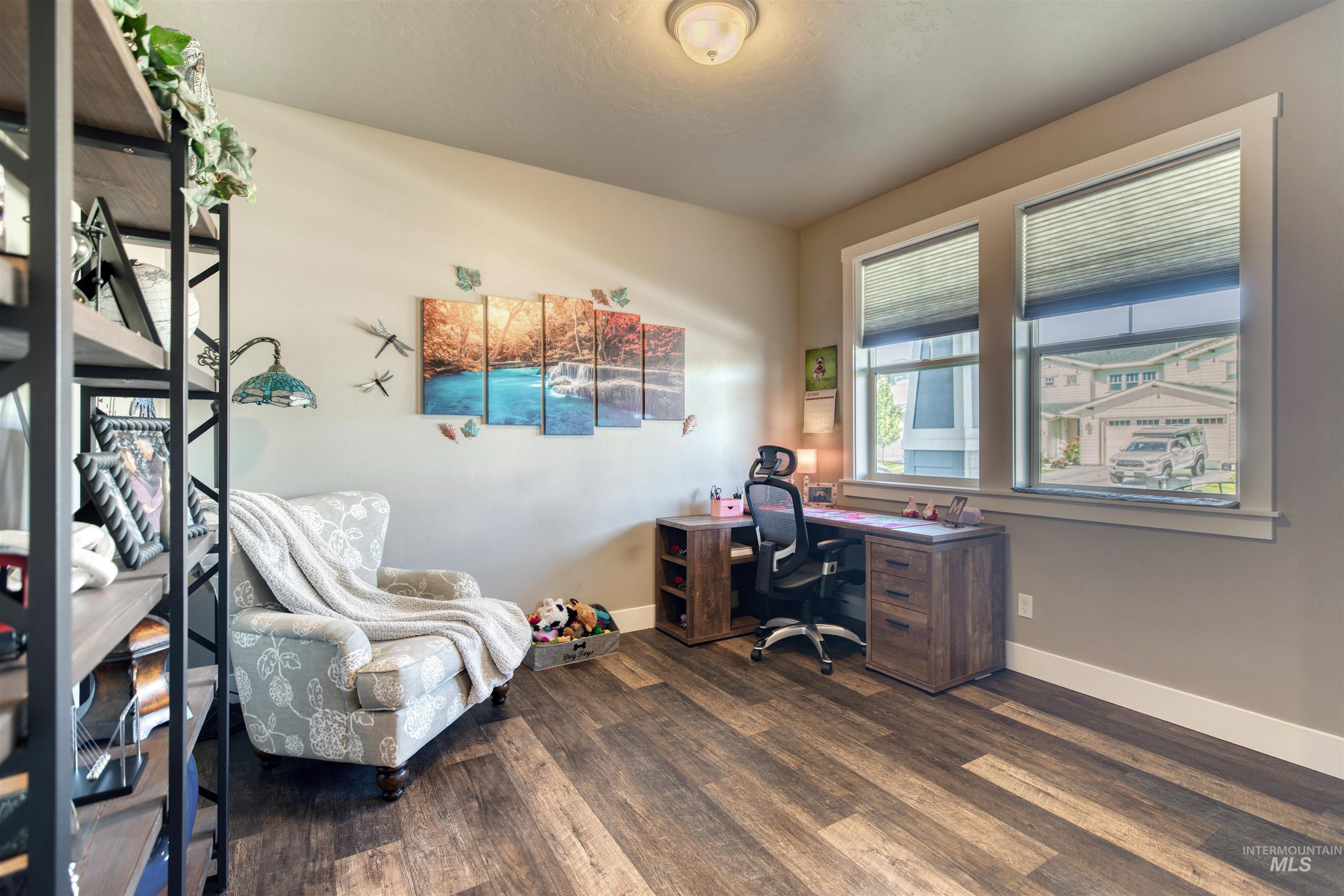 11913 West Piazza Street Nampa, ID 83686 - Photo 6 of 50 Home office with dark wood-style floors and baseboards