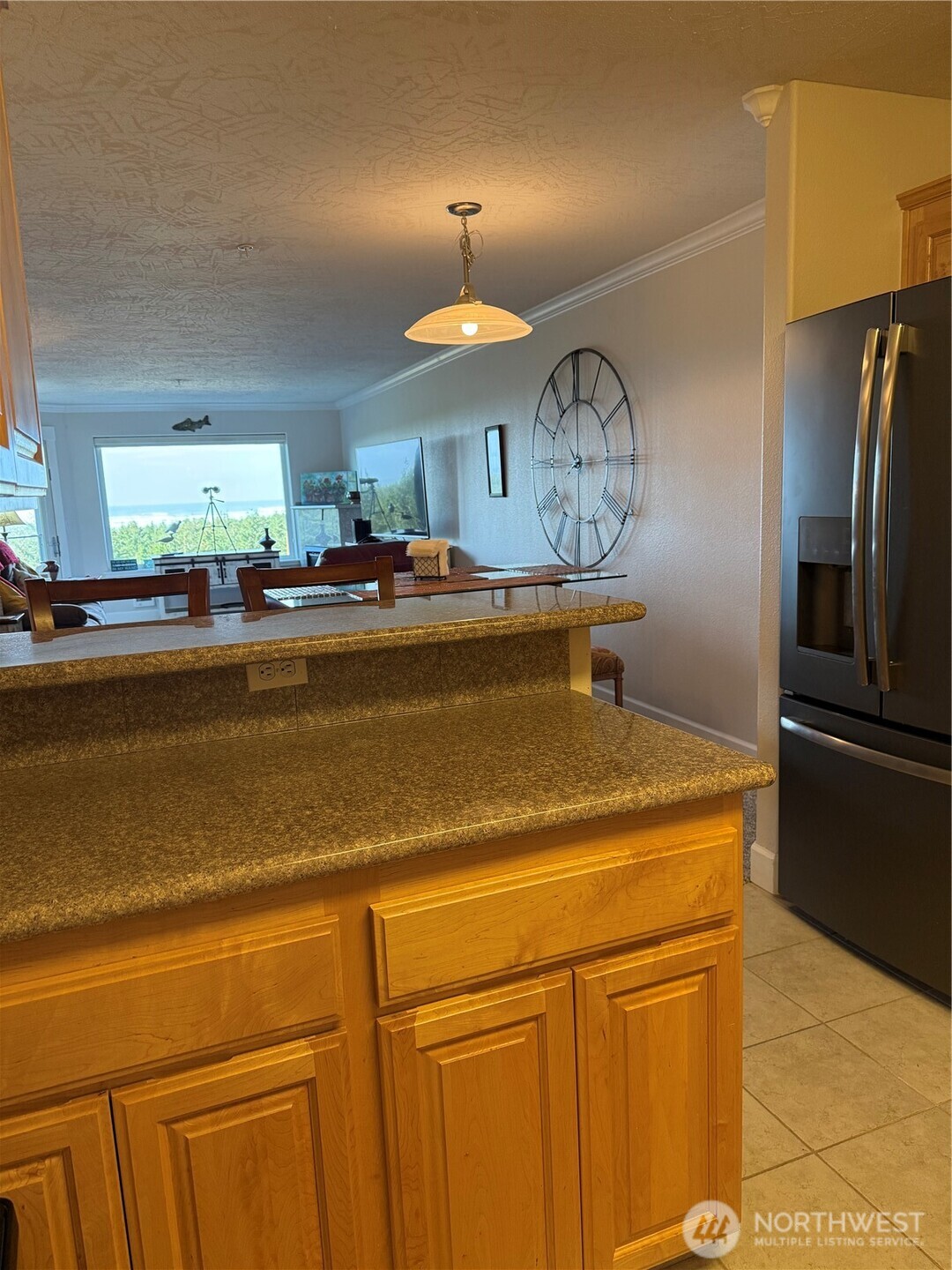 2815 Willows Road, Unit 116 Seaview, WA 98644 - Photo 14 of 30 a view of a kitchen with a stove cabinets and a refrigerator