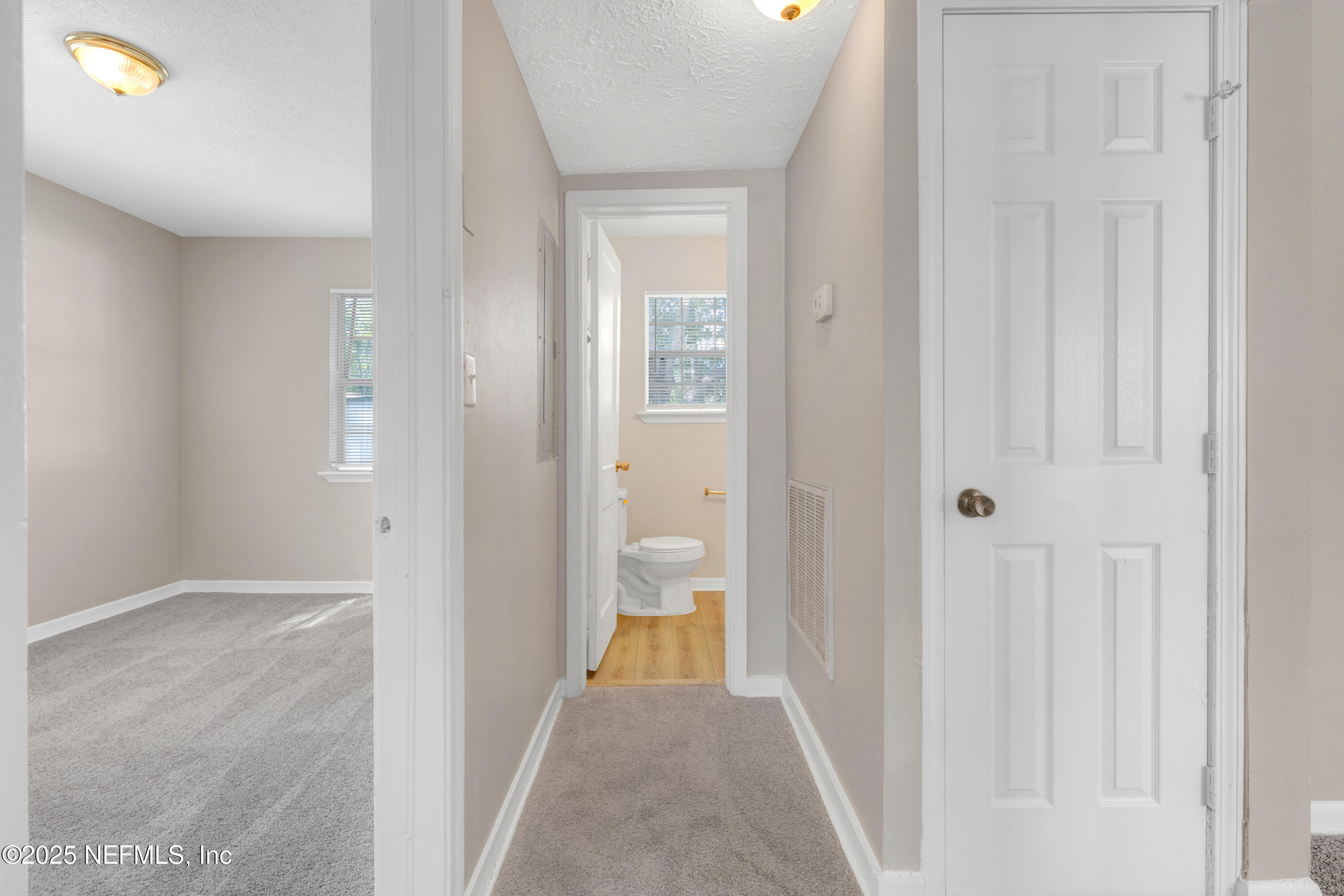 2971 West 16th Street Jacksonville, FL 32254 - Photo 20 of 21 a view of a bathroom from a hallway