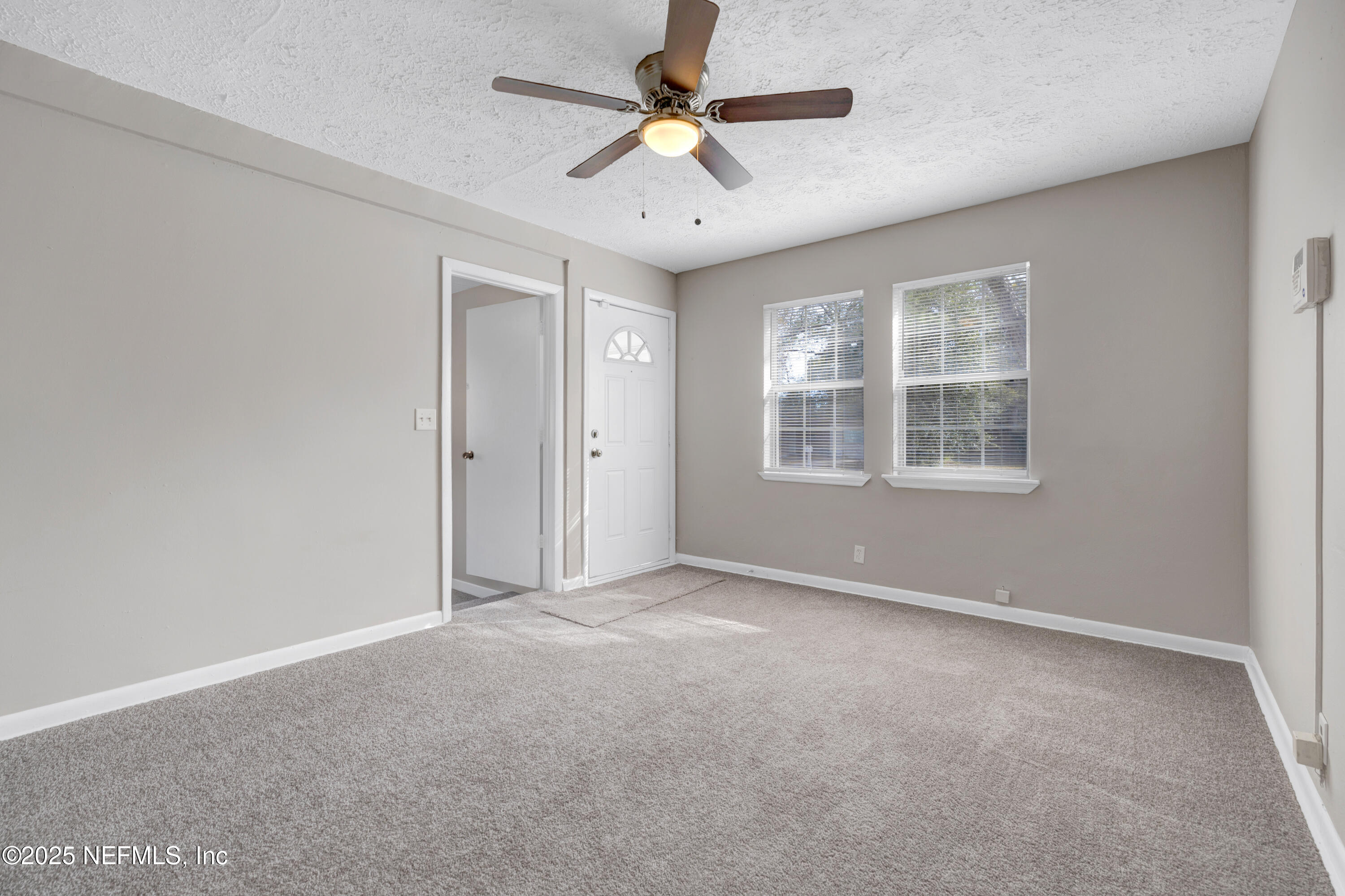 2971 West 16th Street Jacksonville, FL 32254 - Photo 6 of 21 a view of an empty room with a window