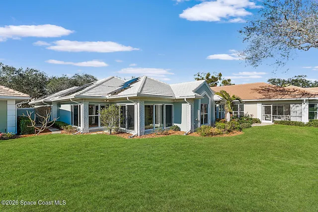 a view of a house with a big yard