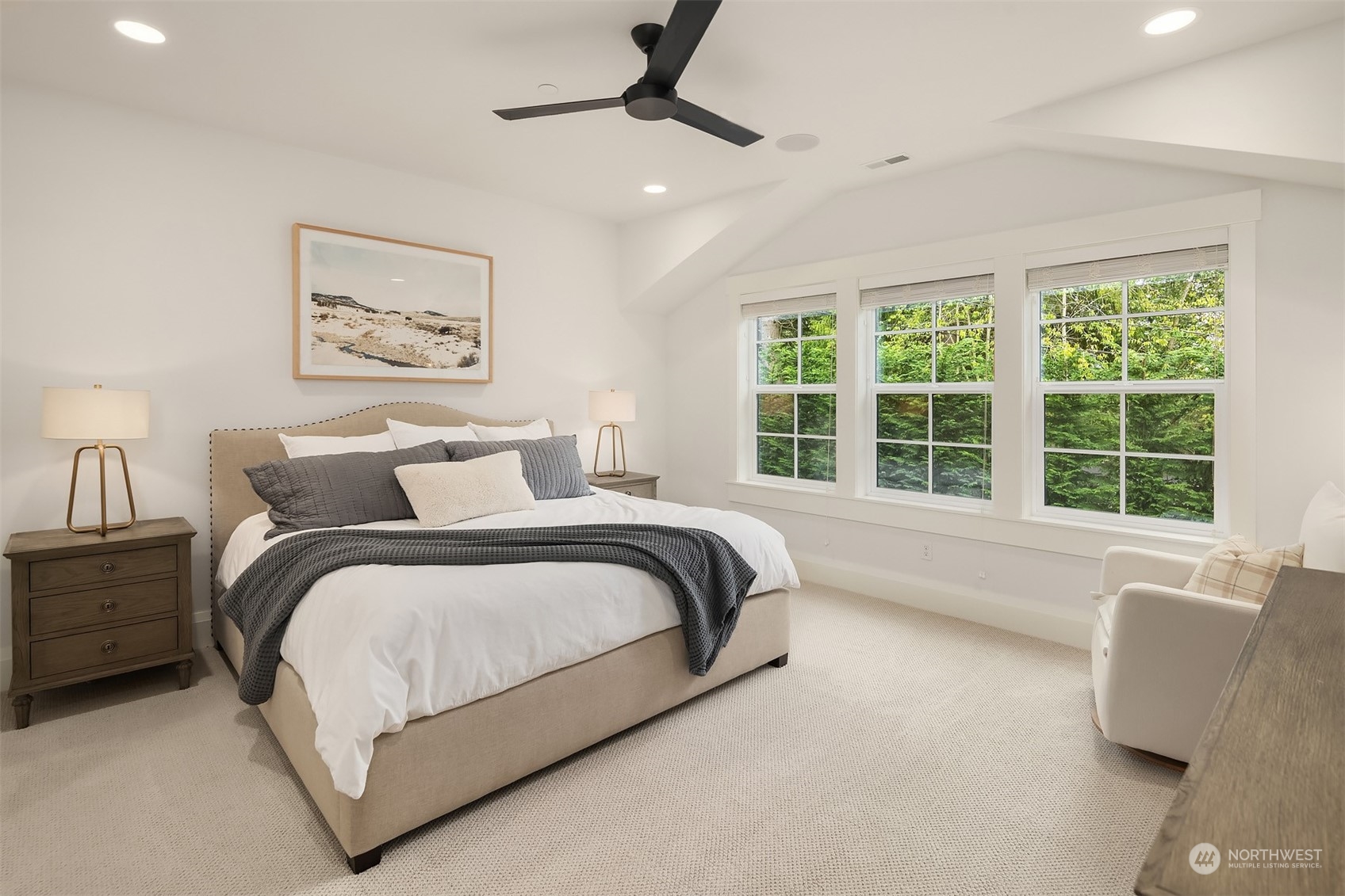 202 Woodhaven Place Edmonds, WA 98020 - Photo 25 of 40 a spacious bedroom with a bed and a large window