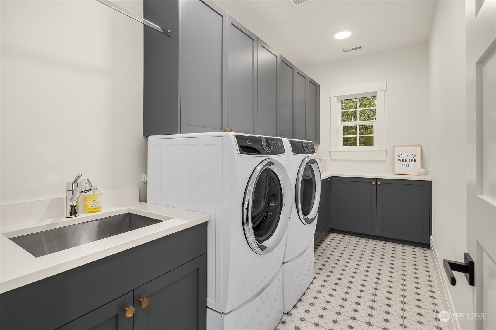 202 Woodhaven Place Edmonds, WA 98020 - Photo 35 of 40 a utility room with dryer and washer