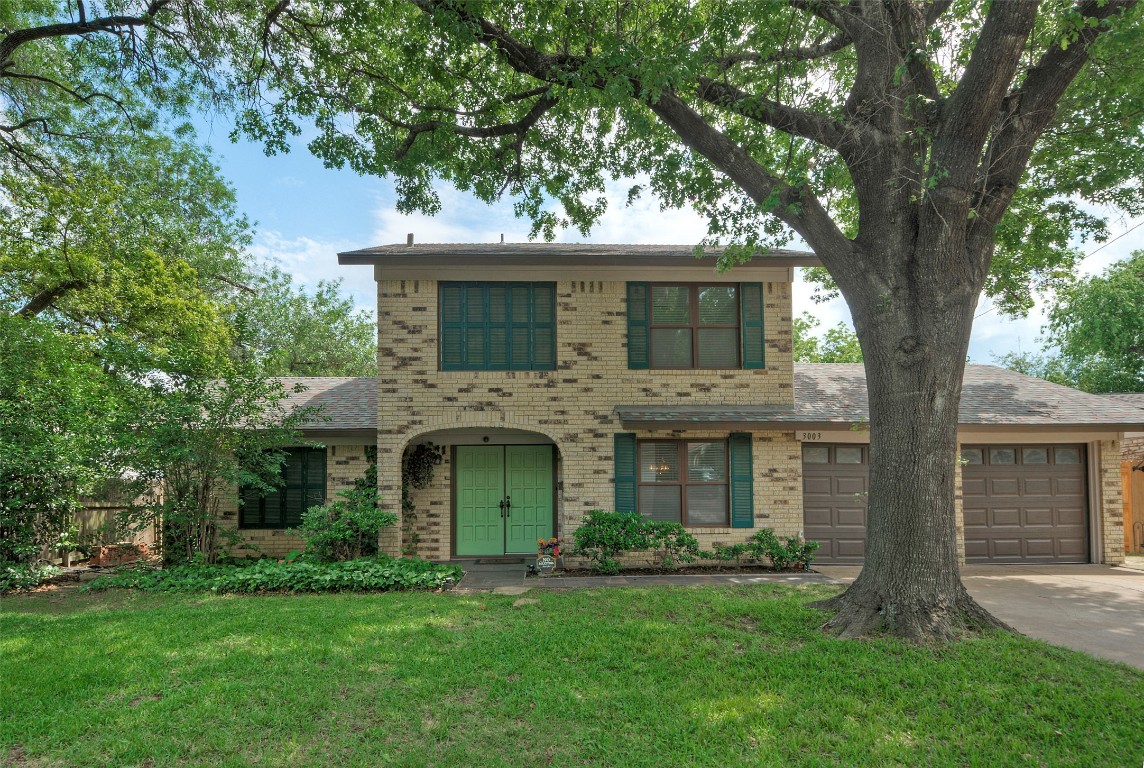 3003 Mohawk Road Austin, TX 78757 - Photo 1 of 1 front view of a house with a yard