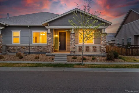 a front view of a house with a garage