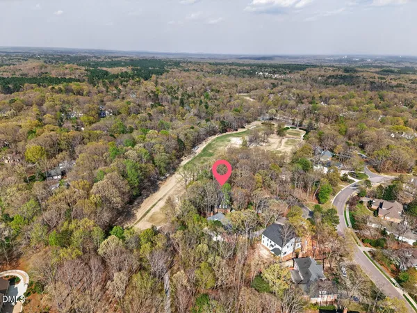 a view of a brick house with a street