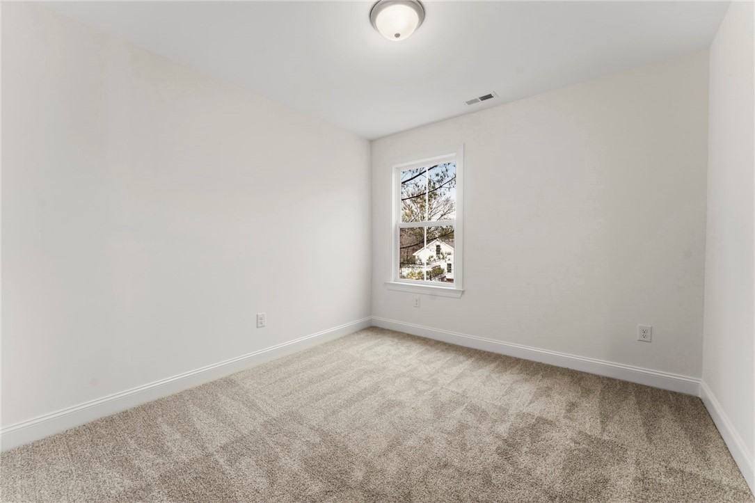 505 Fire Tower Road Williamston, SC 29697 - Photo 28 of 37 This bright and airy room offers a comfortable and inviting atmosphere for everyday living.