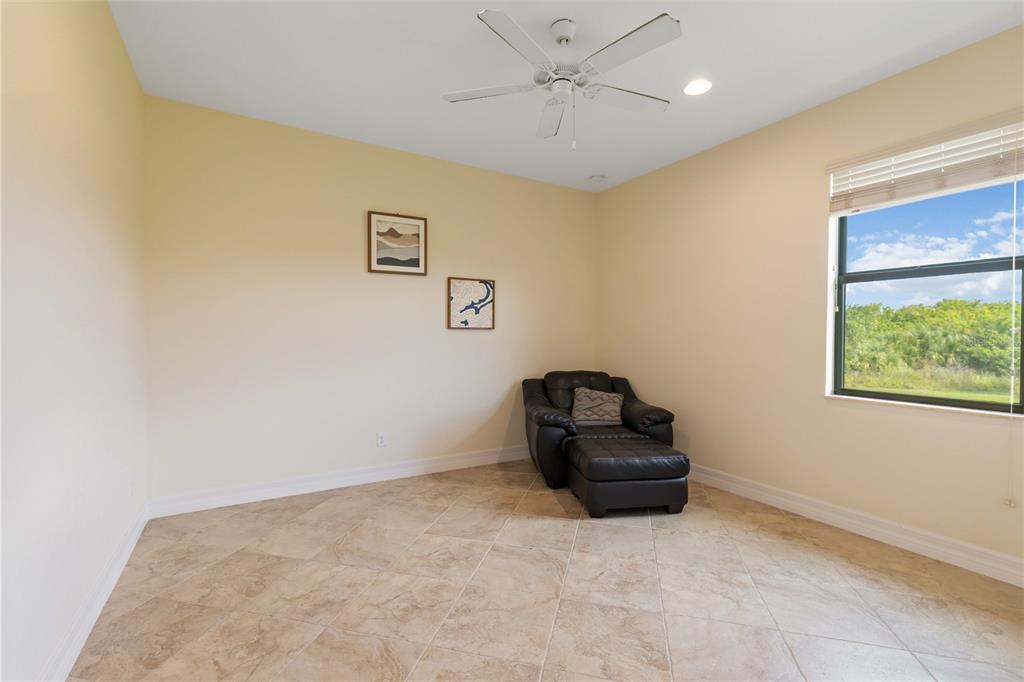 11626 Bridle Path Lane Placida, FL 33946 - Photo 27 of 51 a living room with a couch