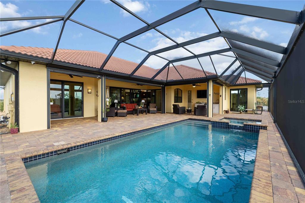 11626 Bridle Path Lane Placida, FL 33946 - Photo 36 of 51 a view of a swimming pool with a patio