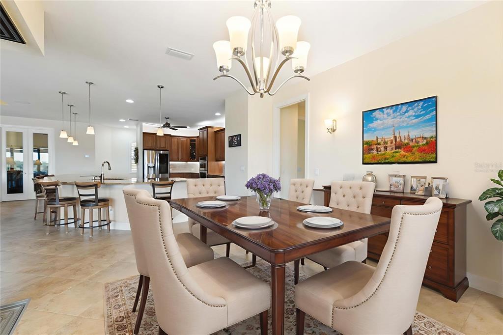 11626 Bridle Path Lane Placida, FL 33946 - Photo 4 of 51 a view of a dining room with furniture
