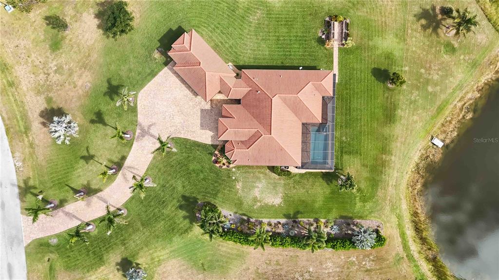 11626 Bridle Path Lane Placida, FL 33946 - Photo 48 of 51 an aerial view of a house with a yard