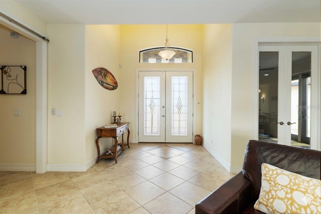 11626 Bridle Path Lane Placida, FL 33946 - Photo 10 of 51 a view of a livingroom with furniture and windows