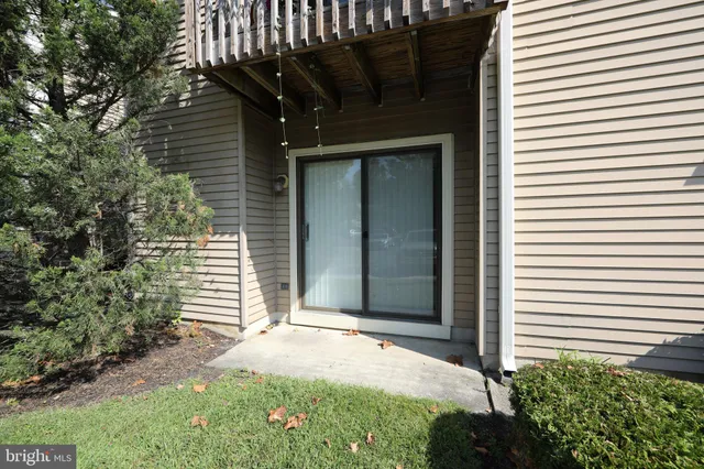 a front view of a house with a garage