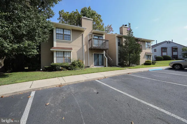 a house with a garden in front of it