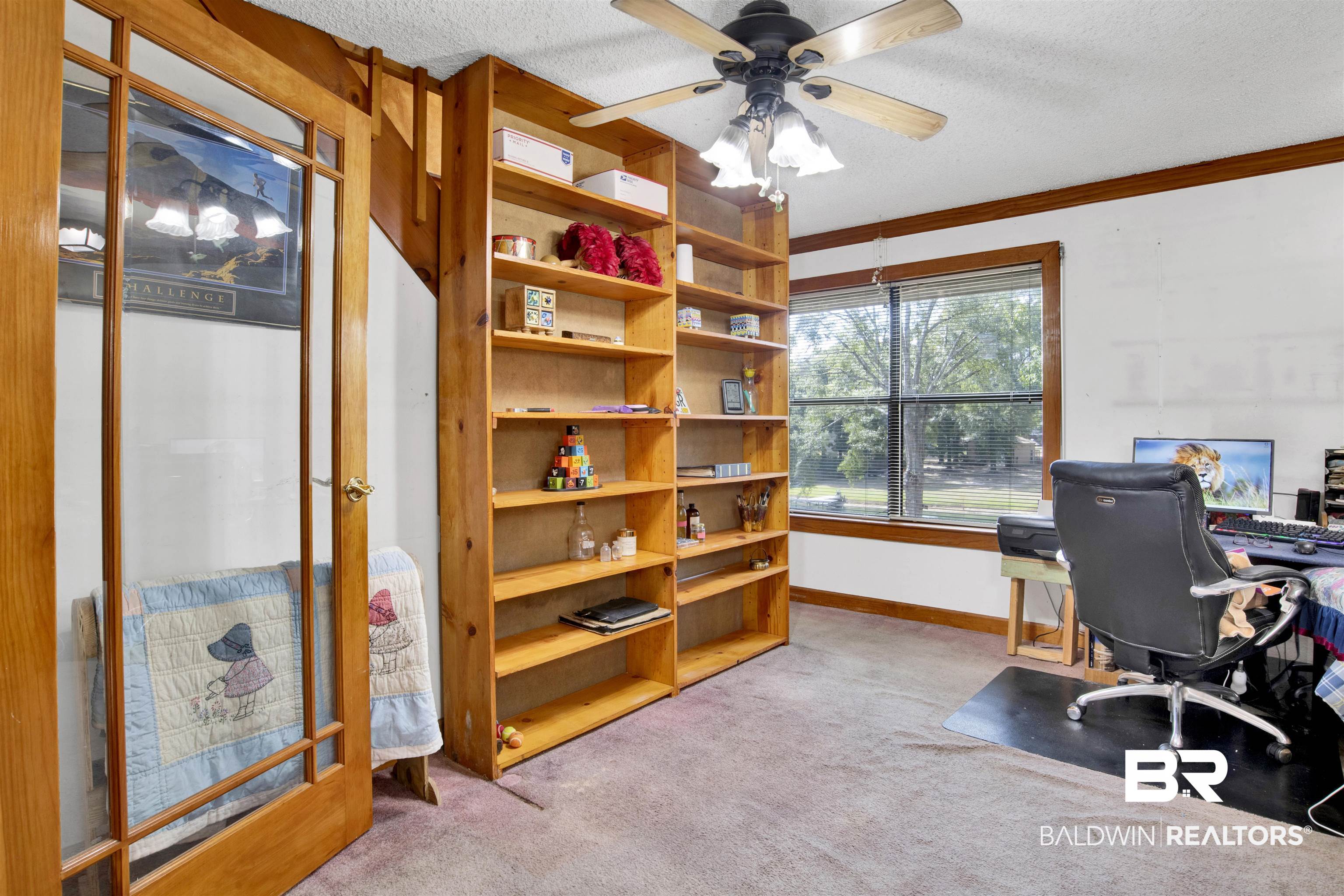 4890 Red Creek Road Semmes, AL 36575 - Photo 26 of 47 Carpeted home office with crown molding, a textured ceiling, and ceiling fan