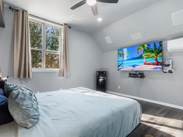 a bathroom with a glass door shower and a sink