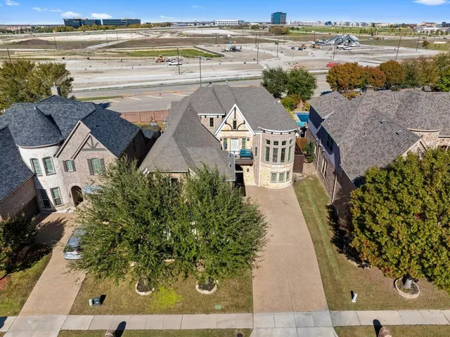 a view of a swimming pool with sitting area
