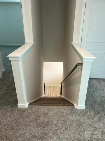 a view of a room that has a window in it