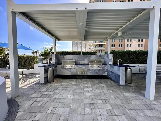 a view of balcony with furniture