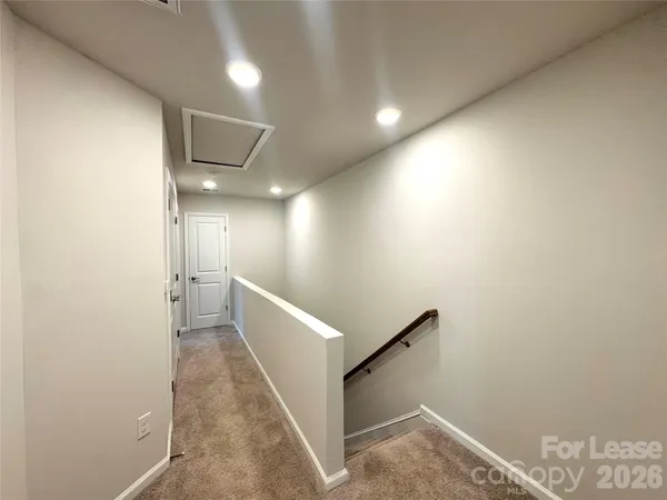 a view of a hallway with entryway