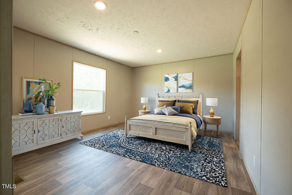 3911 Watson Seed Farm Road Whitakers, NC 27891 - Photo 19 of 28 3911 Virtual Staged Primary Bedroom