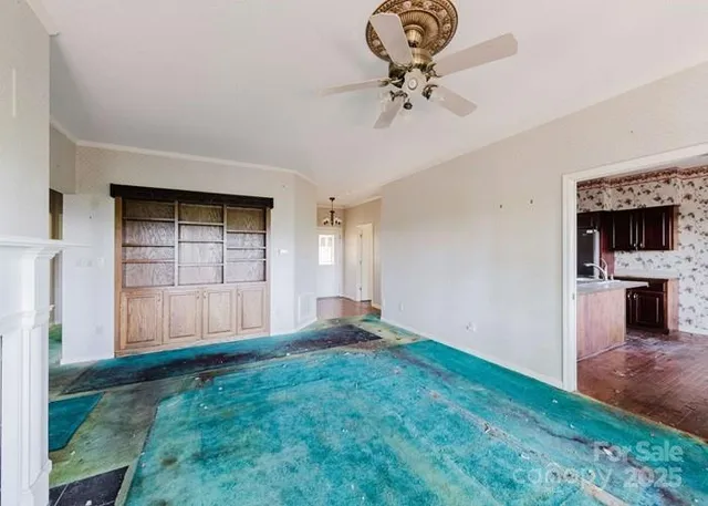 a view of empty room with windows