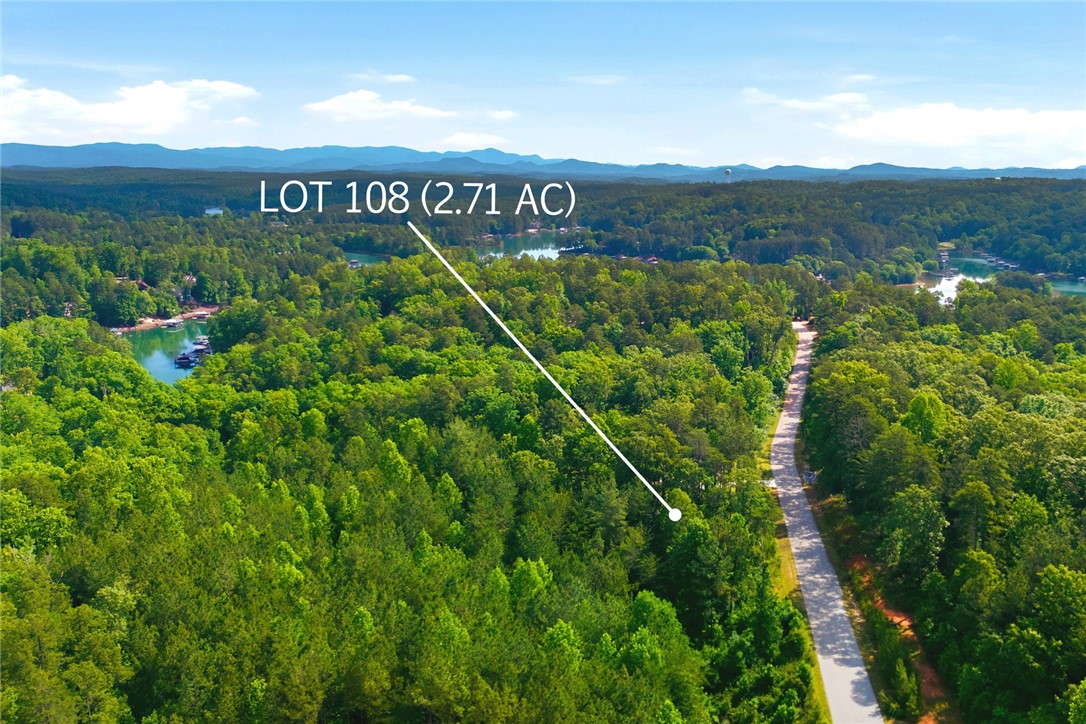 Lot 108 Harbor Ridge Road Seneca, SC 29672 - Photo 5 of 13 This verdant lot offers serene lake views and a tranquil setting for your future home.