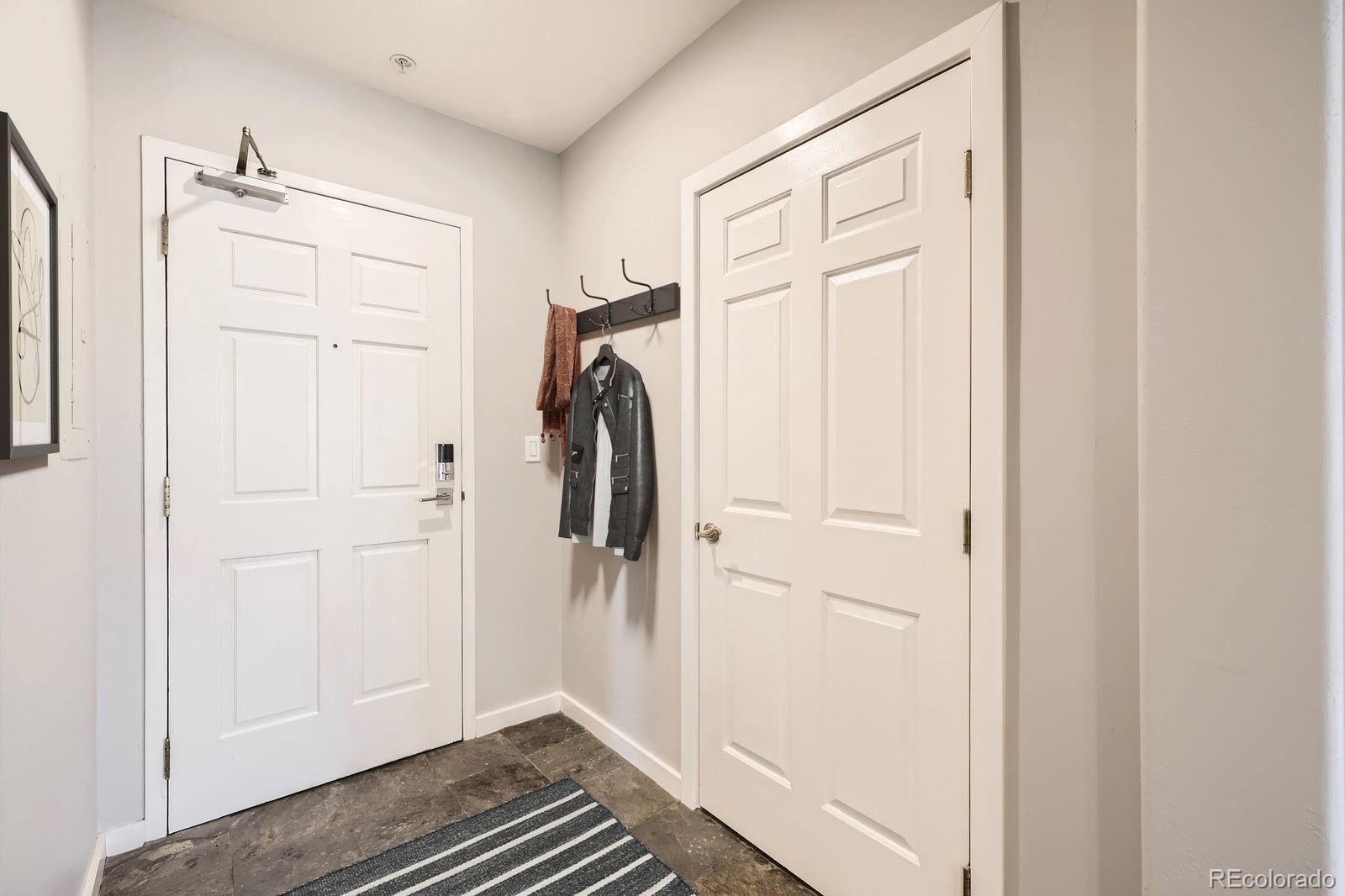 4875 South Monaco Street, Unit 103 Denver, CO 80237 - Photo 20 of 44 a view of closet area