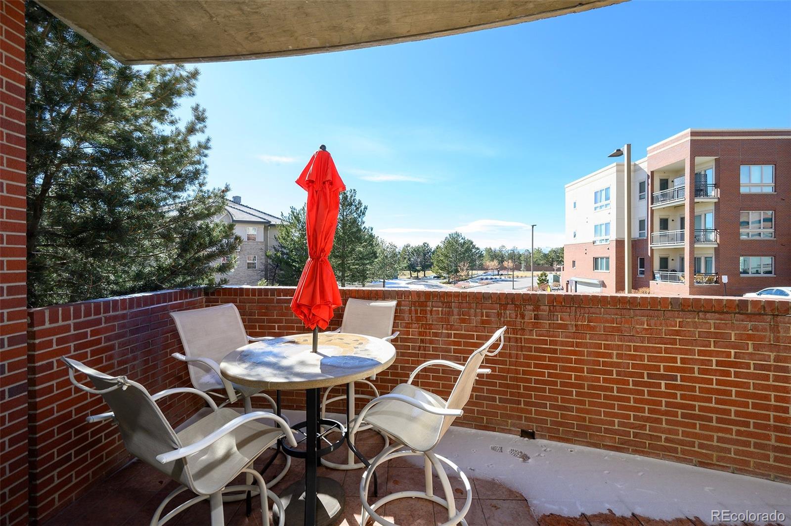 4875 South Monaco Street, Unit 103 Denver, CO 80237 - Photo 21 of 44 a outdoor view with a sitting space