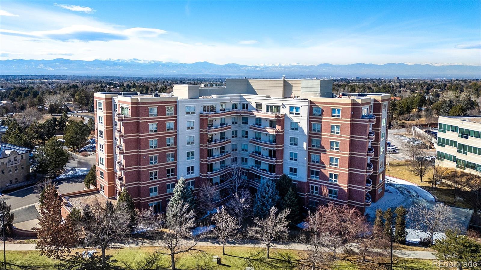 4875 South Monaco Street, Unit 103 Denver, CO 80237 - Photo 31 of 44 a view of a building with a street