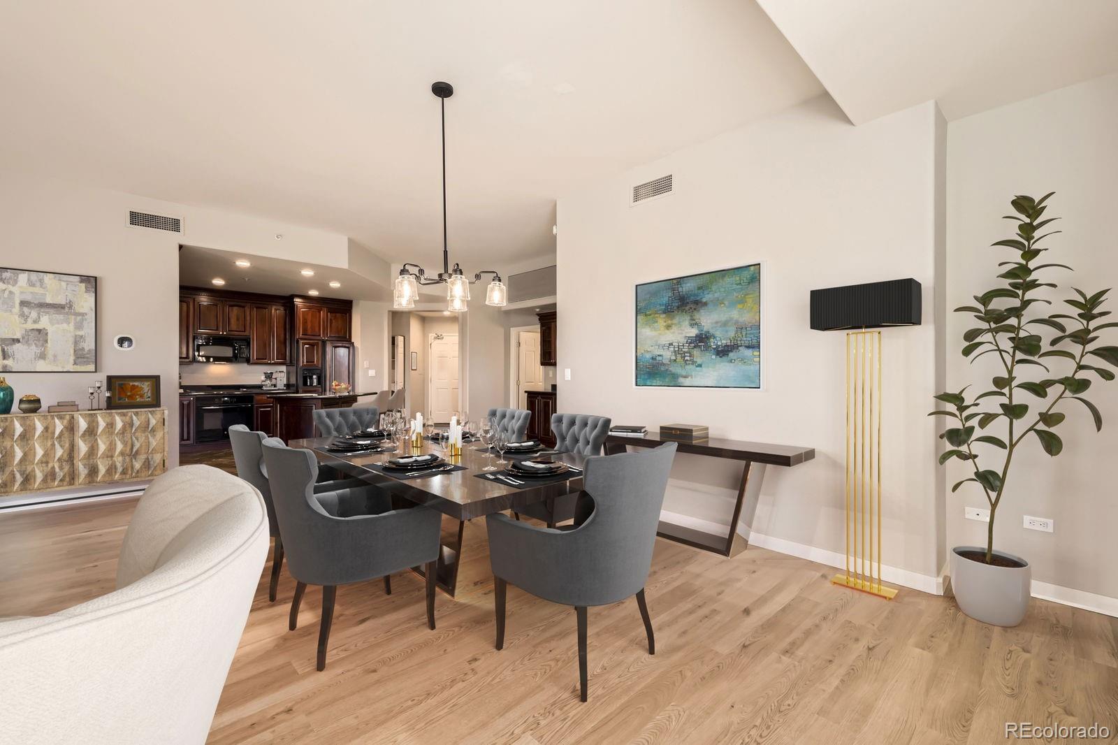 4875 South Monaco Street, Unit 103 Denver, CO 80237 - Photo 6 of 44 a dining room with furniture window wooden floor