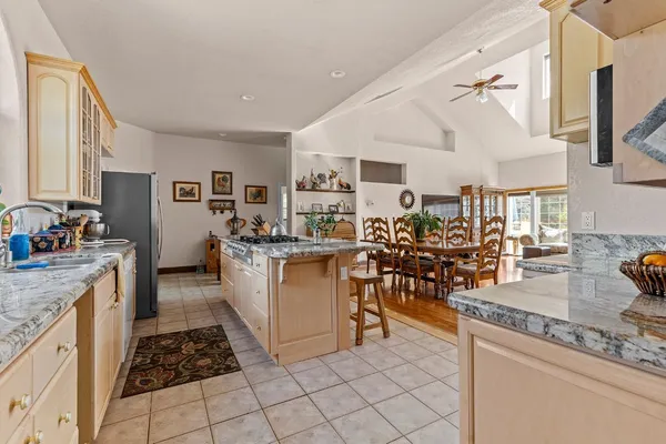 a view of an entryway with a kitchen