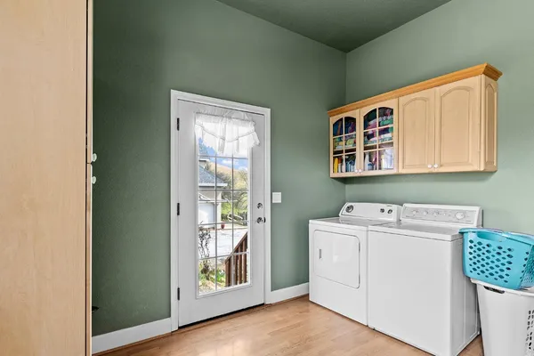 a bathroom with a sink mirror toilet and vanity