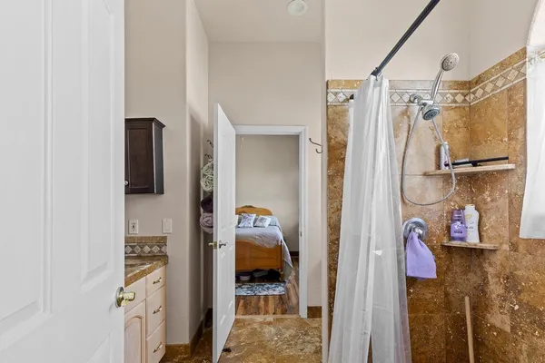 a view of an empty room with a window