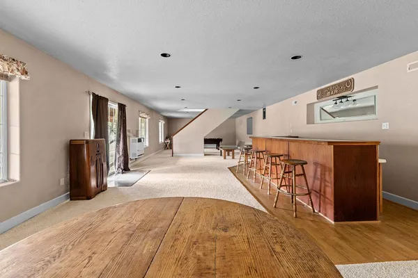 a kitchen that has a sink and a stove