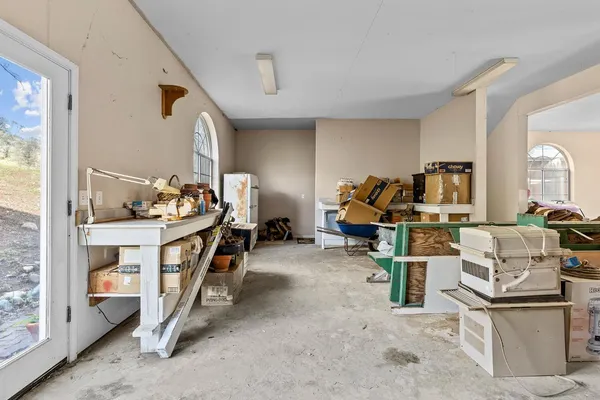 a view of house with swimming pool