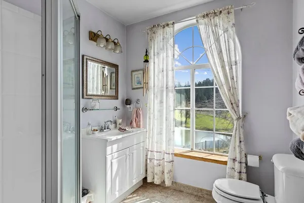 an aerial view of a house with a garden