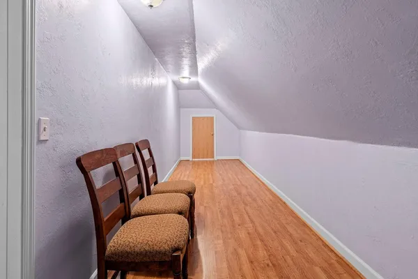 a picture of door of a white building