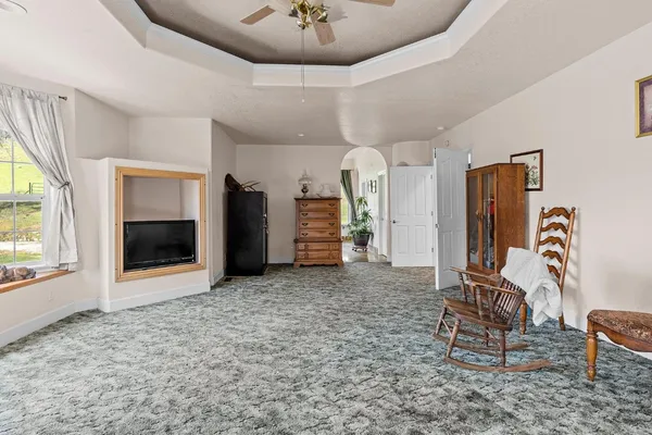 a view of a livingroom with furniture window and outside view