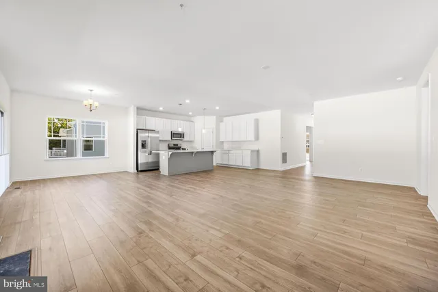 a view of kitchen and windows
