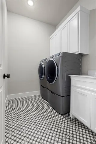 a kitchen with a cabinets and a stove top oven